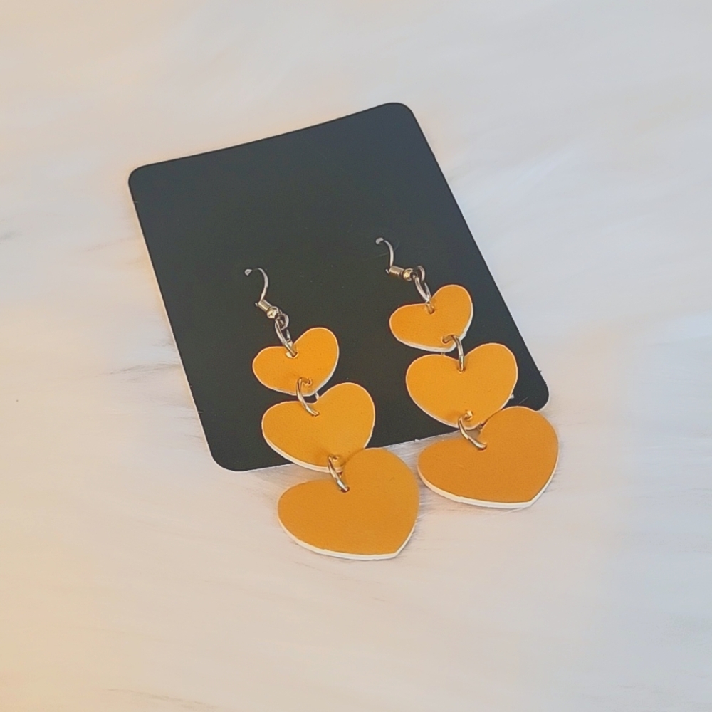 Mustard Dangling Heart Earrings